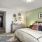Spacious Bedroom with Carpet Flooring at Our Apartments Near Colorado Blvd