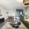 Spacious Living Room and Dining Room Area at Our Virginia Village Apartments in Denver