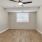 Spacious Bedroom with a Ceiling Fan at Our Cherry Creek, Denver Apartment Community