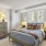 Charming Bedroom with Large Window at Our Apartments Near Dahlia Circle in Glendale, CO